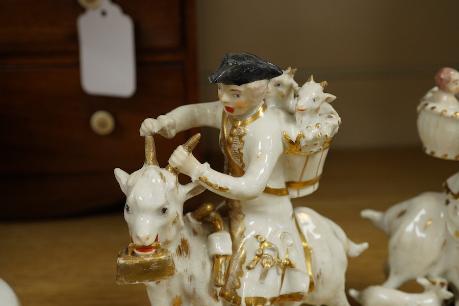 A pair of Bloor Derby white and gilt porcelain figures, Tailor and his Wife, together with a pair of small Imari pattern campaign spill vases, largest 14cm high. Condition - some restoration